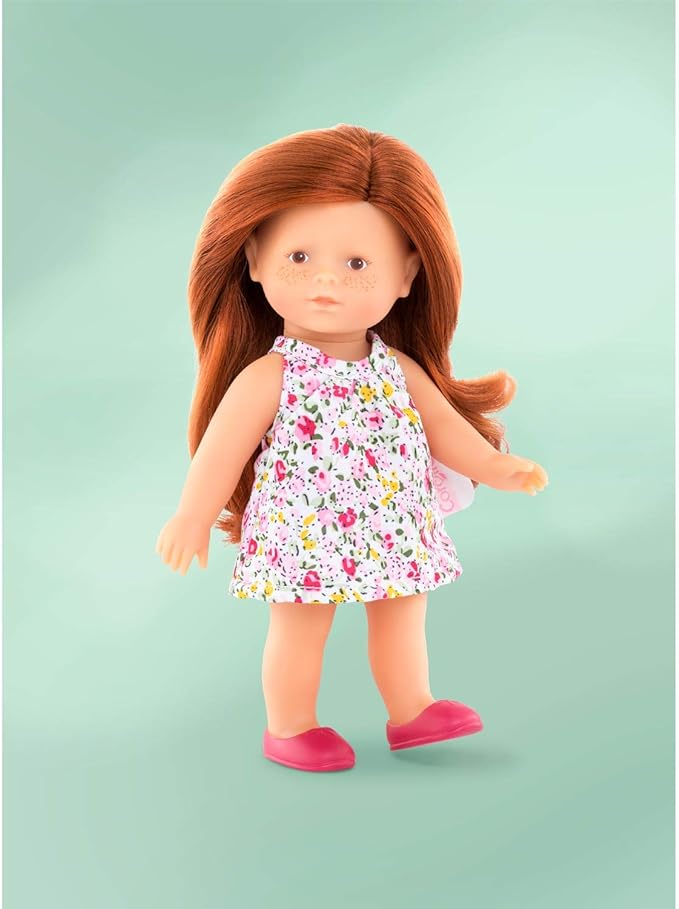 Cute mini baby doll with ruby red hair