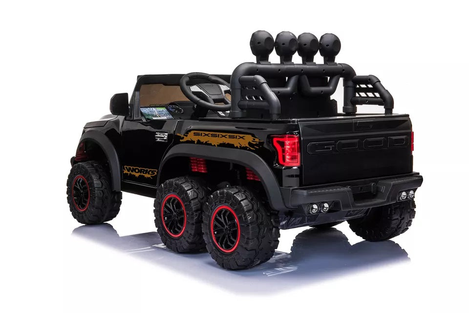 Kids black twelve volt pickup truck