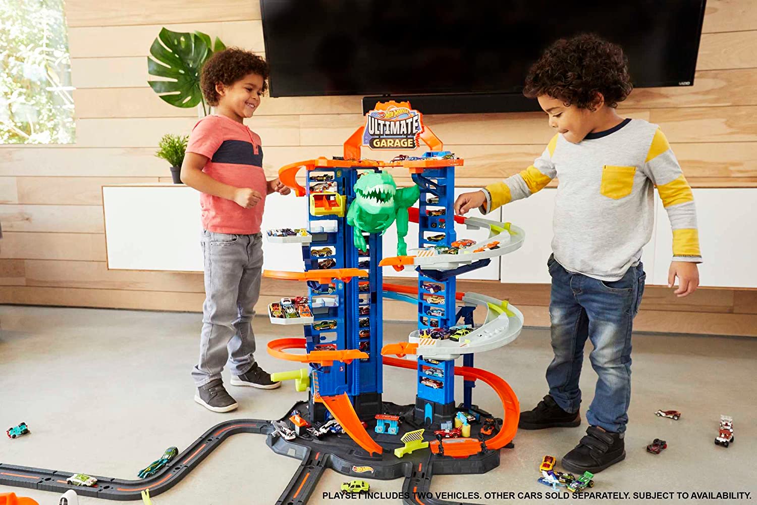 Buy Hot Wheels Track Set Ultimate Garage Toy Vehicle Playset With Moving T-Rex Dinosaur and 2 Cars | Yallatoys.com