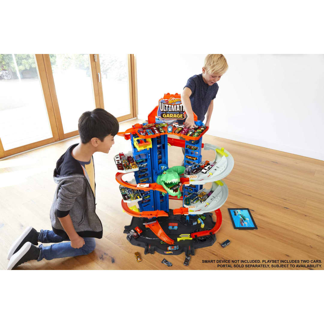 Buy Hot Wheels Track Set Ultimate Garage Toy Vehicle Playset With Moving T-Rex Dinosaur and 2 Cars | Yallatoys.com