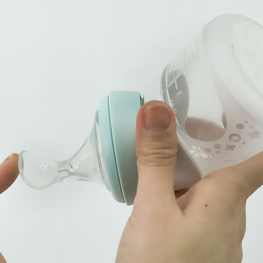 Marcus N Marcus  Silicone Angled Feeding Bottle And Spoon Set  Peach Marcus & Marcus Yallatoys
